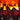 A close-up view of orange and yellow electric fireplace flames glowing behind dark logs in a brick chimney.
